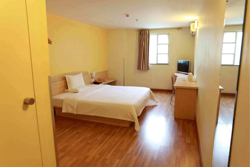 7Days Inn Bazhong Nanchi South Road Phoenix City Quarto foto