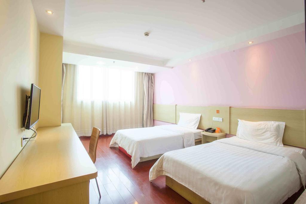 7Days Inn Bazhong Nanchi South Road Phoenix City Quarto foto
