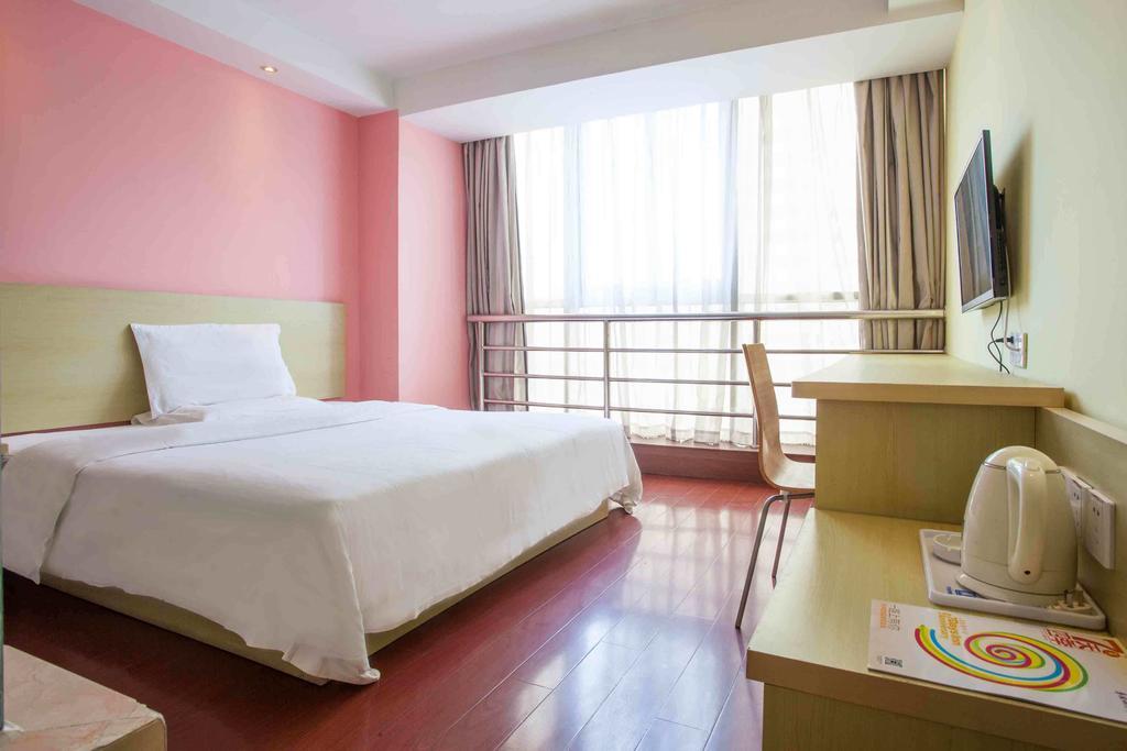 7Days Inn Bazhong Nanchi South Road Phoenix City Quarto foto