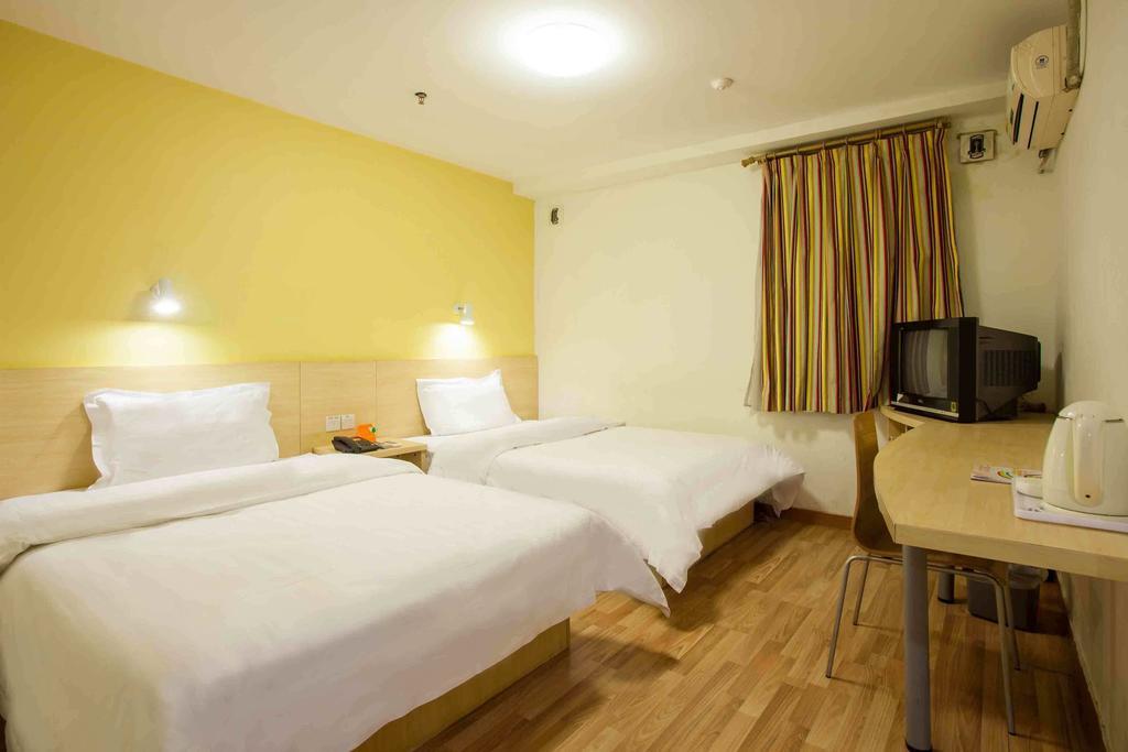 7Days Inn Bazhong Nanchi South Road Phoenix City Quarto foto