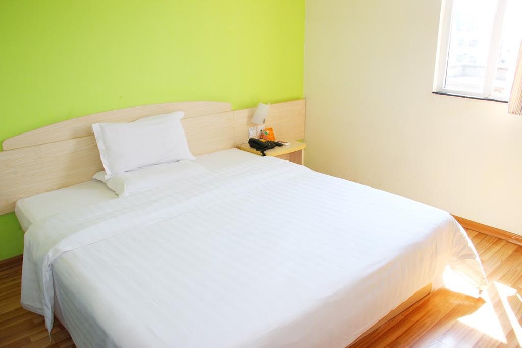 7Days Inn Bazhong Nanchi South Road Phoenix City Quarto foto